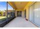 Spacious screened lanai with sliding glass doors, perfect for enjoying the outdoors at 11321 Ledgement Ln, Windermere, FL 34786