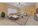 Inviting living room featuring neutral tones, modern furnishings, and a cozy atmosphere at 11321 Ledgement Ln, Windermere, FL 34786