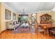 Elegant living and dining areas with hardwood floors, chandelier, and ornate decor at 11321 Ledgement Ln, Windermere, FL 34786
