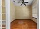 Bright office space featuring hardwood floors, large window, and ceiling fan at 11321 Ledgement Ln, Windermere, FL 34786