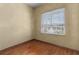 Bright office space featuring hardwood floors and a large window at 11321 Ledgement Ln, Windermere, FL 34786
