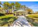 Picnic pavilion with tables, offering a shaded area for community gatherings at 11321 Ledgement Ln, Windermere, FL 34786