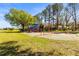 Community playground with colorful equipment and a grassy play area at 11321 Ledgement Ln, Windermere, FL 34786