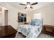 Inviting bedroom with a ceiling fan, closet, and serene decor at 14285 Oconner Rd, Kathleen, FL 33849