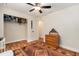 Well-lit bedroom with ceiling fan and closet at 14285 Oconner Rd, Kathleen, FL 33849