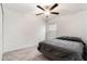 Neutral bedroom with a ceiling fan, window for natural light, and plush gray carpeting at 1700 Red Loop, Lakeland, FL 33801