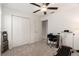 Bedroom with white walls, large closet, ceiling fan and a treadmill, great for a home gym at 1700 Red Loop, Lakeland, FL 33801