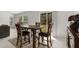 Dining area with wood table and chairs, offering a cozy space for meals at 1700 Red Loop, Lakeland, FL 33801