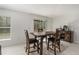 Inviting dining area with stylish wood table and chairs near a bright window at 1700 Red Loop, Lakeland, FL 33801