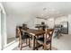 Bright dining area with kitchen view, featuring a solid wood table and seating at 1700 Red Loop, Lakeland, FL 33801