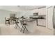 Bright kitchen with white cabinets, granite countertops, and stainless steel appliances at 1700 Red Loop, Lakeland, FL 33801