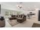 Spacious living area featuring an open-concept design and a large sectional sofa at 1700 Red Loop, Lakeland, FL 33801