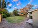 Expansive backyard with lush greenery, perfect for outdoor activities and relaxation at 231 4Th St, Winter Haven, FL 33880