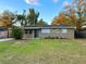 Charming single-story home featuring a well-maintained lawn and a classic facade at 231 4Th St, Winter Haven, FL 33880