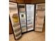 Interior view of a stainless steel side-by-side refrigerator and freezer at 231 4Th St, Winter Haven, FL 33880