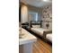 Modern bedroom featuring two beds, a study desk, decorative wall art, and ample natural light at 3151 Sunset Walk Dr # 314, Kissimmee, FL 34747