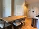 Dining area with a large table and seating for six, near the entrance at 3151 Sunset Walk Dr # 314, Kissimmee, FL 34747