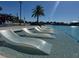 Zero-entry pool with in-water loungers for relaxing at 3151 Sunset Walk Dr # 314, Kissimmee, FL 34747