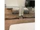 Bedroom with mirrored nightstands and a television with the bed partially in view at 168 Claffey Ct, Haines City, FL 33844
