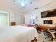 Spacious bedroom with a ceiling fan and white walls, ready for relaxation at 1743 Wilshire Ct, Lakeland, FL 33813