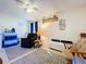 Living room featuring bowler decor, sitting and carpeted flooring at 1743 Wilshire Ct, Lakeland, FL 33813
