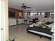 Bedroom with a bed, a desk and ceiling fan at 661 Crane Dr, Kissimmee, FL 34759