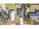 Aerial view of a single story home featuring a long driveway and metal building at 420 Tecumseh N Ave, Fort Meade, FL 33841