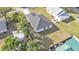 Aerial view of a single story home featuring a fenced-in backyard with green space and mature trees at 420 Tecumseh N Ave, Fort Meade, FL 33841