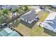Aerial view of a single story home featuring a fenced-in backyard with green space and mature trees at 420 Tecumseh N Ave, Fort Meade, FL 33841