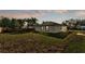 Backyard view featuring a well-maintained lawn and fenced-in yard at 420 Tecumseh N Ave, Fort Meade, FL 33841