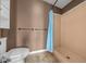 Cozy bathroom featuring a walk-in shower, toilet, and towel rack at 1717 Lilly Ln, Lady Lake, FL 32159