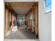 The open garage shows ample space for storage and projects at 1717 Lilly Ln, Lady Lake, FL 32159