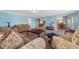 Comfortable living room with an open floor plan and lots of natural light at 1717 Lilly Ln, Lady Lake, FL 32159