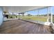 A bright patio featuring wood flooring and a stunning view at 1717 Lilly Ln, Lady Lake, FL 32159