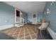 Cozy porch features a decorative rug and a seating area at 1717 Lilly Ln, Lady Lake, FL 32159