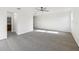 Spacious bedroom features carpet, ceiling fan, and natural light at 2938 Rodrick Cir, Orlando, FL 32824