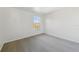 Bright bedroom with neutral carpet and a window offering natural light at 2938 Rodrick Cir, Orlando, FL 32824