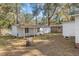 Outbuildings and a partially fenced yard are located in the rear at 3925 Ne 92Nd Pl, Anthony, FL 32617