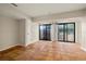 Bright room featuring tile flooring, neutral walls, and sliding glass doors to the outside at 12 Lake Link Dr, Winter Haven, FL 33884