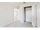 Bedroom featuring a carpeted floor and large closet at 3230 Baird Ave, Lakeland, FL 33805