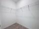 Empty walk-in closet with built-in shelving for ample storage at 6244 Great Bear Dr, Lakeland, FL 33805