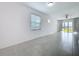 Bright living room featuring a ceiling fan, tile floors, neutral paint, and an abundance of natural light at 6244 Great Bear Dr, Lakeland, FL 33805