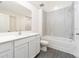 Elegant bathroom with a tub, a shower with a white tile backsplash, and modern fixtures at 3804 Corsican Pl, Lake Alfred, FL 33850