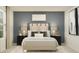 Stylish bedroom showcasing a padded headboard, soft lighting, and coordinated decor for a serene space at 4727 Bold Peacock Bnd, Bartow, FL 33830