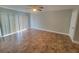 Spacious living room with tile floors, a ceiling fan and sliding glass doors to a patio at 6187 Brookhill Cir, Orlando, FL 32810