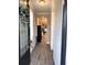 Inviting foyer with tile floors, leading into the living area, offering a glimpse of the home's open layout at 2188 Palm Tree Dr, Kissimmee, FL 34759