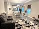 Open concept living room with sight lines to kitchen and dining areas at 2188 Palm Tree Dr, Kissimmee, FL 34759