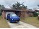 Charming single-story brick home with a paved driveway and one car garage at 2865 Barton Pl, Bartow, FL 33830