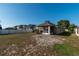 The house's backyard and screened patio overlook the large yard with ample space for recreation at 4067 Sw 46Th Ter, Ocala, FL 34474