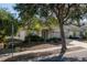 View of the front exterior of the house with a well-maintained yard and beautiful landscaping at 4067 Sw 46Th Ter, Ocala, FL 34474